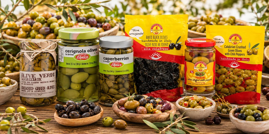 Italian green and black olives, caperberries and Calabrian seasoned olives in an olive grove.